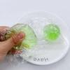 Jugo de fruta transparente Pinch música transparente cubo de hielo transparente ventilación de descompresión bola juguete rebote lento regalo caricatura