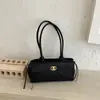 2026 transfronterizo nueva moda bolso tipo almohada simple bolso de hombro casual coreano para mujer bolso de mano con textura de lujo ligero
