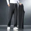 Pantalones de chándal gruesos y forrados de forro polar para hombre para otoño e invierno, adecuados para hombres de mediana edad, corte holgado, talla grande, pantalones casuales de pierna recta