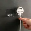 Gancho de enchufe transparente sin dejar marca Gancho adhesivo de almacenamiento para enchufe de electrodoméstico Soporte para enchufe de cable de aparato Gancho para cable de datos