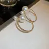 Pendientes de Perla de Circonita de Moda de Aguja Plateada Pendientes de Botón Retro de Lujo Ligero de Nicho Francés Pendientes Nuevos 2026