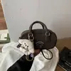 Bolso Moderno con Estampado de Oso para Mujer 2026 Nuevo Ins Sensación de Alta Gama Colgante de Oso Bolso de Hombro Cruzado Bolso de Mano