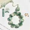 Cadena para teléfono móvil de raíz Bodhi con garra de gato, pareja, lindo cordón para funda de teléfono, colgante para unidad USB, llavero Wenwan para mujer al por mayor