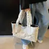 Bolsa de Ombro Feminina 2025 Nova Moda Início da Primavera Estilo Coreano Elegante com Laço Plissado Grande Capacidade