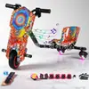 Suministro exclusivo transfronterizo de coche eléctrico inteligente de deriva para niños, kart de deriva de tres ruedas, coche de deriva de un asiento giratorio 360 grados