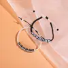 Pulsera tejida de letras acrílicas blanco y negro para parejas, cuerda de mano, joyería de moda europea y americana al por mayor