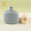 50g Crema de Manos con Fragancia Corporal Tapa Flip Hidratante Humectante Botella de Presión Botella de Viaje Fábrica de Empaques de Cosméticos