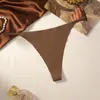 Tanga de una pieza sin costuras para mujer de seda helada transpirable sexy de tirantes finos de cintura baja con fuelle de algodón puro, pantalón T para mujer, transfronterizo europeo y americano