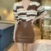 PU Sexy Pequeña Ultra Corta Ol 2023 Nueva Cadera Pequeña Falda de Cuero Falda Corta Profesional Negra Ajustada Falda Mujeres