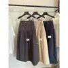 Dela Uma Dose de Doçura 2026 Início do Outono Estilo Simples Design Plissado Versátil Emagrecedor Saia Longa Roupa Feminina 66652