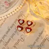 Aretes de Clip para Oreja Repelentes de Mosquitos Flor de Camelia Perla Sin Perforación Nuevos para Mujer Estilo Francés