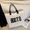 Bolso de mano de moda grande y casual con estampado de letras, nuevo bolso de hombro cruzado tejido de verano 2026