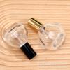 Botella de perfume redonda con forma de bayoneta, 30 ml y 50 ml, con pulverizador de vidrio, para agua cosmética, venta al por mayor