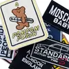Parches Cuadrados de Bordado Inglés en Stock Bordados por Computadora para Bolsos y Ropa Accesorios Fábrica de Origen en Foshan Venta al por Mayor
