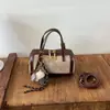 Bolso Retro de Gama Alta para Mujer 2026 Nuevo Bolso Cubo Lujo Ligero Colgante Bolso de Hombro Único Versátil para Viajar Bolso Cruzado Comercio Exterior