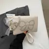 Súper Populares Este Año, los Bolsos Cuadrados Pequeños Están en Tendencia. Nuevos Bolsos de Hombro para Mujer Otoño e Invierno 2025, Bolsos Cruzados, Bolsos Cruzados de Moda y con Estilo