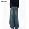 Jeans lavados estilo retro americano JIAMU para hombres y mujeres, pantalones anchos holgados vintage azules de pierna ancha y corte curvo, versátiles para el estilo callejero de otoño e invierno