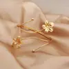 Colección de Pulseras de Brazo, Pulseras Abiertas Metálicas con Flor y Borla Transfronterizas Europeas y Americanas para Mujer, Moda Personalizada, Accesorios de Estilo Marino Sencillo