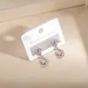 Pendientes Huecos de Flor y Lazo de Venta Caliente Europeos y Americanos, Pendientes Pequeños Creativos en Forma de Corazón, Pendientes de Lujo Ligero de Nicho