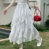 Saia longa ondulada com babados de renda branca transfronteiriça para mulheres, fina, cintura elástica, estilo A, irregular, primavera/verão