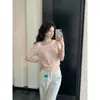 Blusa de tricô ombro a ombro vazada estilo francês para mulheres, verão estilo coreano branca que rejuvenesce, manga curta, justa, design de nicho