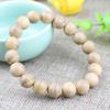 Venta al por mayor de fábrica pulsera de madera con fragancia a leche indonesia para hombre y mujer, pulsera de cuentas para parejas, pulsera de sándalo con fragancia a leche natural