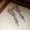 Brincos de tachinha de prata de luxo europeus e americanos com borlas florais cravejadas de diamantes, brincos de luxo leve de alta qualidade, brincos de design moderno atacado
