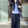 Conjunto casual de trabalho azul marinho, com corte relaxado, para mulheres, nova coleção outono 2026, apresentando uma camisa falsa de duas peças e calças de perna larga