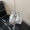 Bolso de Mano Pequeño para Mujer 2025 Nuevo Primavera Bolso Cubo con Cordón Versátil Estampado de Flores Bolso Cruzado con Cadena Ins