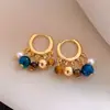 Pendientes de Borla con Cuentas de Piedra Ojo de Tigre Estilo Retro Francés Lujo Ligero Pendientes de Gama Alta Modernos Exquisitos Pendientes Personalizados Venta al por mayor