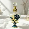 Botella de perfume de vidrio esmaltado de 10 ml con aroma a amor, para salón de belleza, con sensación avanzada, para aceites esenciales, embotellada al vacío.