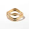 Pulsera Popular Transfronteriza de Metal Brillante con Forma de Ola Estilo Minimalista Europeo y Americano Pulsera Abierta Irregular Fábrica de Joyería para Mujer