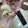 Llavero de Oro Puro 999 Colgante Dorado, Año del Caballo Bolsita de la Suerte de Pan de Oro Adorno Colgante para Coche, Regalo de Alta Gama