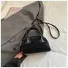 Bolsa de Bowling de Mão Chic Nicho Coreano Feminina Moda Nova Primavera 2026 Ombro Único Transversal Bolsa Almofada