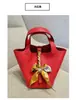 2025 Nueva Bolsa Cesta de Verduras Primera Capa Patrón de Lichi Piel de Vaca Tendencia de Moda Gran Capacidad Estilo Casual Bolso Cubo Portátil