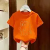 Camiseta Estampada de Algodão Puro Manga Curta 2026 Verão Kidsren's Soltinha Tops de Verão para Meninas Tamanhos Médio e Grande Camiseta de Manga Meia-Manga Kidsren's