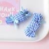 Accesorios de joyería de caramelo de tela frescos y dulces accesorios para el cabello zapatos con agujero material de pegamento de crema diy al por mayor pj1647