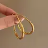 Pendientes retro de letras geométricas de alta calidad, diseño de nicho simple, pendientes de moda que combinan con todo.
