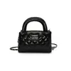 Bolso portátil de hombro cruzado para mujer 2025 Bolso pequeño estilo Chanel Bolso de línea bordado rómbico de moda estilo chica popular de primavera