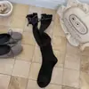 Calcetines largos de algodón puro para mujer, para primavera y otoño, estilo lolita, de maternidad, con ribete de encaje y detalle de lazo