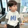Camiseta de manga larga para niño, algodón puro, nuevo modelo 2026, camiseta base tipo dos piezas para niños, top interior para niños mayores, para primavera y otoño