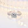 Anillo de circonita de cuatro garras simple de moda europea y americana para mujer, fotos de bodas de plata con apertura, fabricantes de anillos de diamantes festivos, una generación de cabello