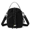 Bolso cruzado de color bloqueado para exteriores, Mochila pequeña multifuncional, Bolso para botella de agua de doble uso de alta apariencia, Bolso de hombro para senderismo y montañismo