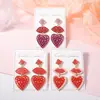 Moda Europea y Americana Romántico Día de San Valentín Nicho Diseño Creativo Aleación Diamante Perlas de Arroz Colgante de Amor Pendientes para Mujer