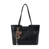 Bolsa tote retrô transfronteiriça para mulheres, novo design moderno e versátil de 2026, simples e elegante, adequada para o dia a dia, grande capacidade, bolsa de ombro ou bolsa de axila