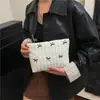 Bolsa Quadrada Pequena de Luxo Leve Estilo Coreano Tendência Transfronteiriça para Mulheres, Novo Modelo Primavera 2026, Bolsa de Mão Bordada com Laço, Bolsa de Festa Tendência