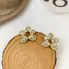 Pendientes de Diseño Único y de Nicho Estilo Francés de Lujo Ligero Pendientes Minimalistas con Flor Hueca de Pedrería Pendientes de Botón de Gama Alta