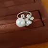 Anillo abierto de flor de perla incrustado con circonita y diamante, sensación de nicho de alta gama, joyería exquisita de estilo palaciego de lujo ligero al por mayor