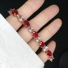 Venda quente transfronteiriça conjunto de rubi sintético ouro rosa brincos de diamante vermelho de alta qualidade colar anel Novo presente de Ano Novo para mulheres