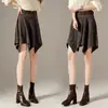Falda A-line irregular de gamuza vintage para mujer, nueva colección otoño 2026, de cintura alta, falda corta versátil en un estilo moderno